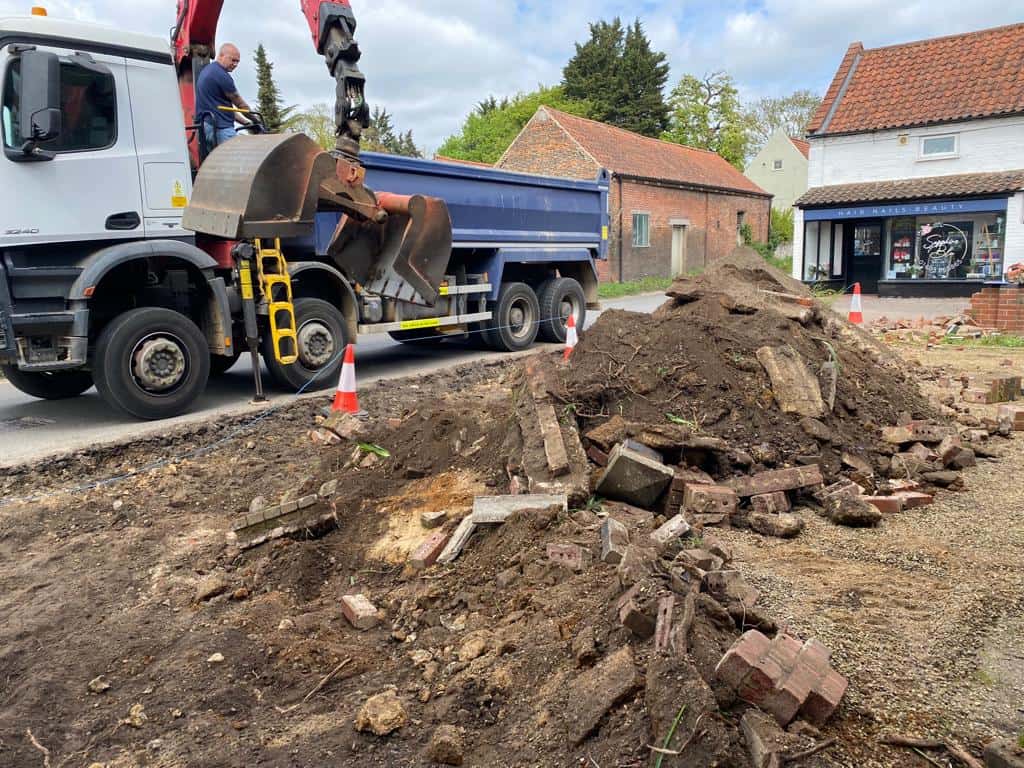 This is a photo of a dig out being carried out for the installation of a new tarmac driveway. Works being carried out by Ashford Driveways