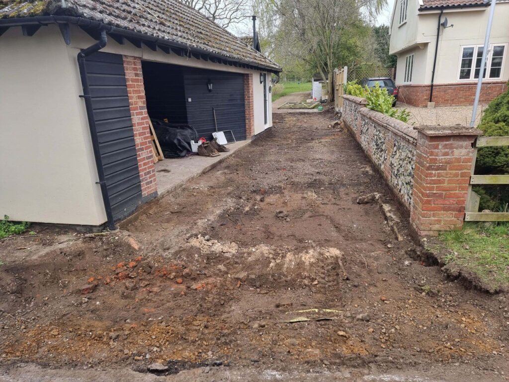 This is a tarmac driveway that is in the process of being dug out and installed by Ashford Driveways